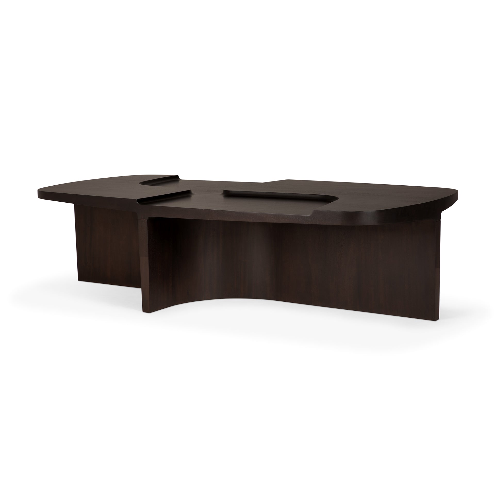 The Ethnicraft Brutalist Coffee Table features a modern design in dark wood, crafted from solid mahogany with a curved front, thick panel legs, minimalist cut-out details, and a polished finish that echoes iconic Brutalist style.
