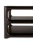 Close-up of the Eda Coffee Table by Ethnicraft, featuring a modern design with dark wood, rounded edges, and two tiers. The smooth curves and clean lines highlight its heirloom-quality construction and refined European craftsmanship.