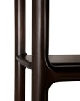 Close-up of an Eda Console | Wide dark mahogany rack console table, showing the rounded corner and shelf joint.