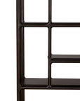 Close-up view of an Ethnicraft Eda Rack featuring a dark wood shelving unit with rounded, interconnected frame edges.