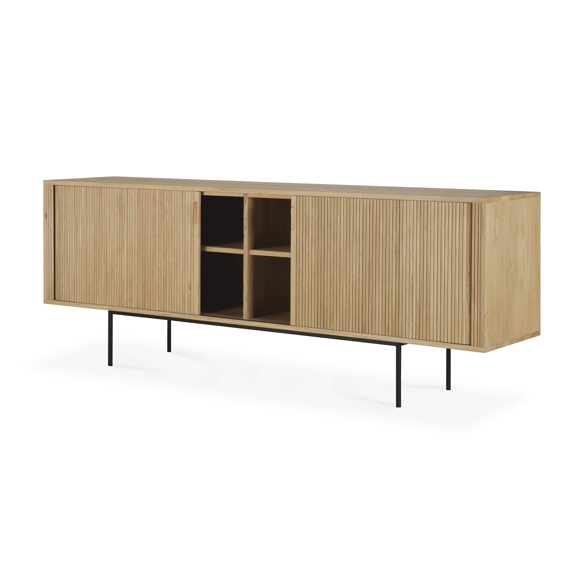 The Ethnicraft Roller Max Sideboard showcases grooved sliding doors, four central open shelves, and slim black metal legs. Crafted in a light natural wood finish, it blends modern design with the quality of solid oak.