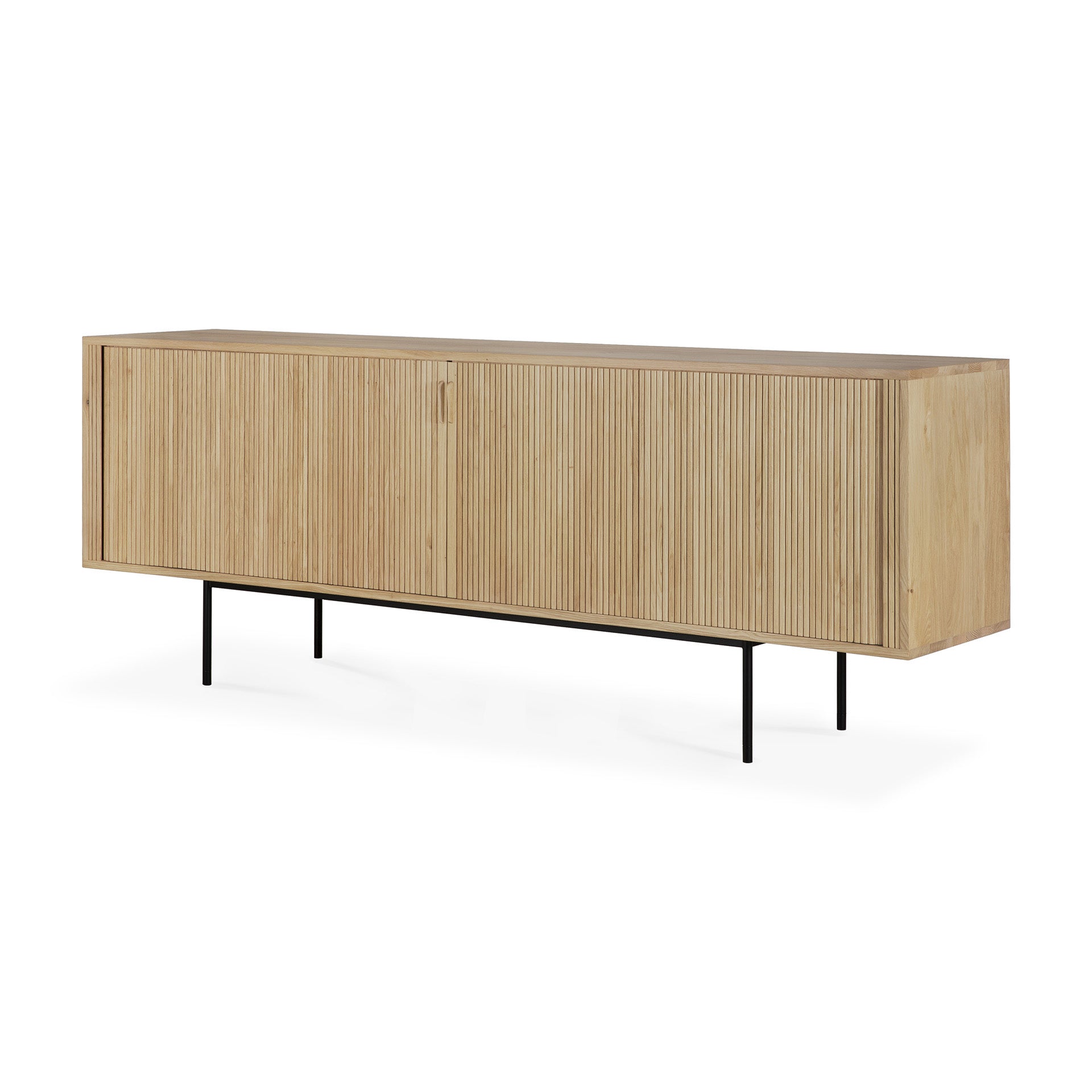 The Ethnicraft Roller Max Sideboard showcases vertical grooved doors, a light natural finish, and slim black metal legs for a modern look.