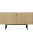 The Ethnicraft Roller Max Sideboard is a modern wooden design featuring vertical grooves, two cabinet doors, and slim black metal legs, showcased against a white background.