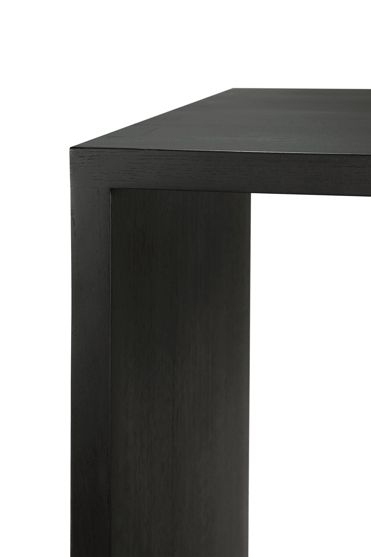 Close-up of the corner and top surface of the U Desk - Black Oak by Ethnicraft, a modern rectangular desk with a minimalist black finish, set against a white background.