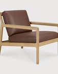Ethnicraft Jack Lounge Chair - Burgundy Leather featuring a solid oak frame and burgundy leather seat and back cushions.