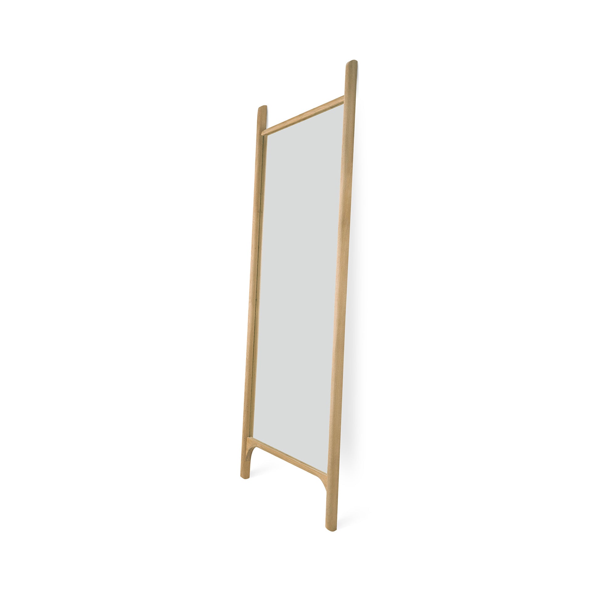 The Ethnicraft PI Floor Mirror – Oak features a tall, rectangular design with a rounded solid oak frame and legs, a polished imperfect finish, and stands upright at a slight angle against a white background.