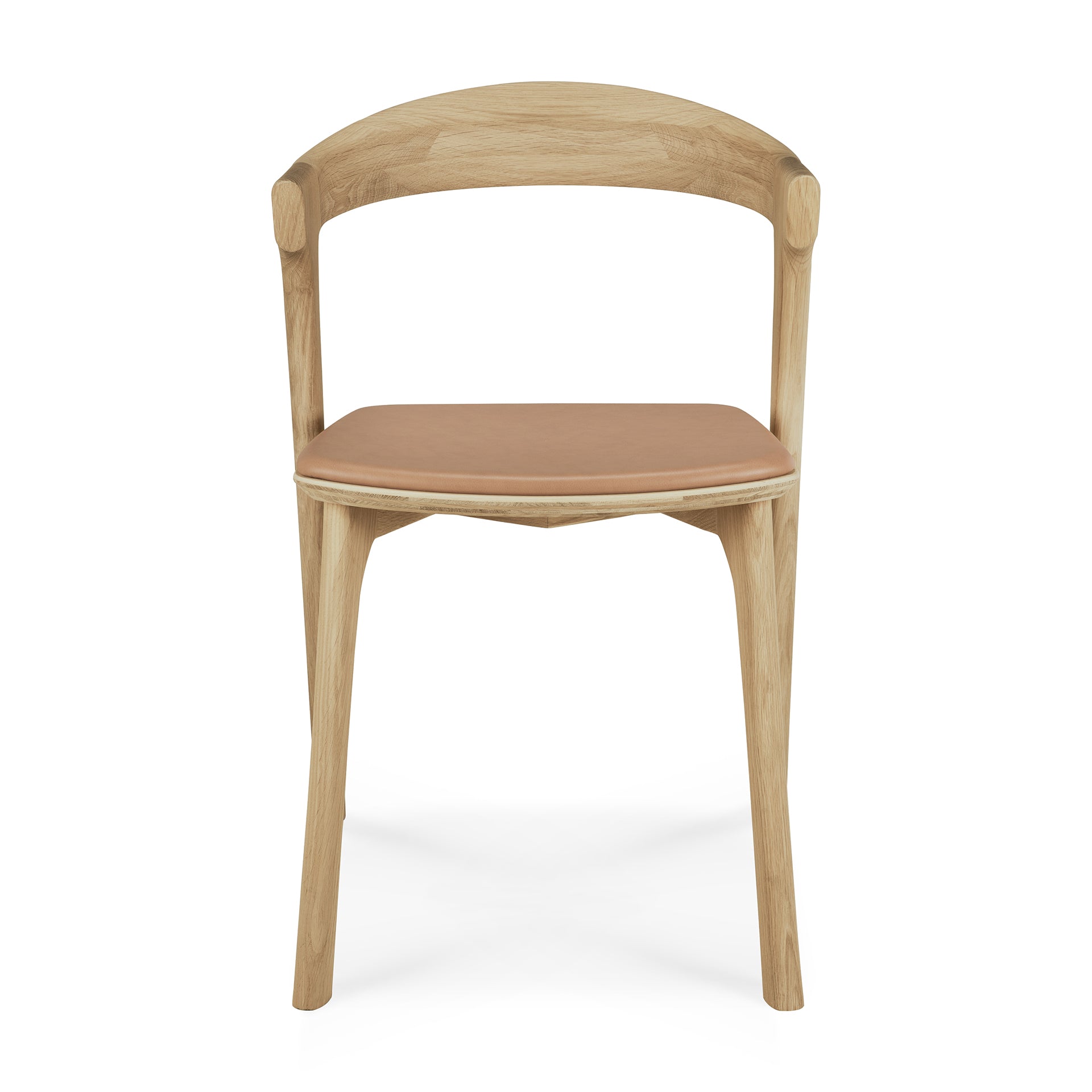 The Bok Dining Chair by Ethnicraft, made from solid oak with a curved backrest and a sienna leather cushioned seat, is shown from the front against a white background.