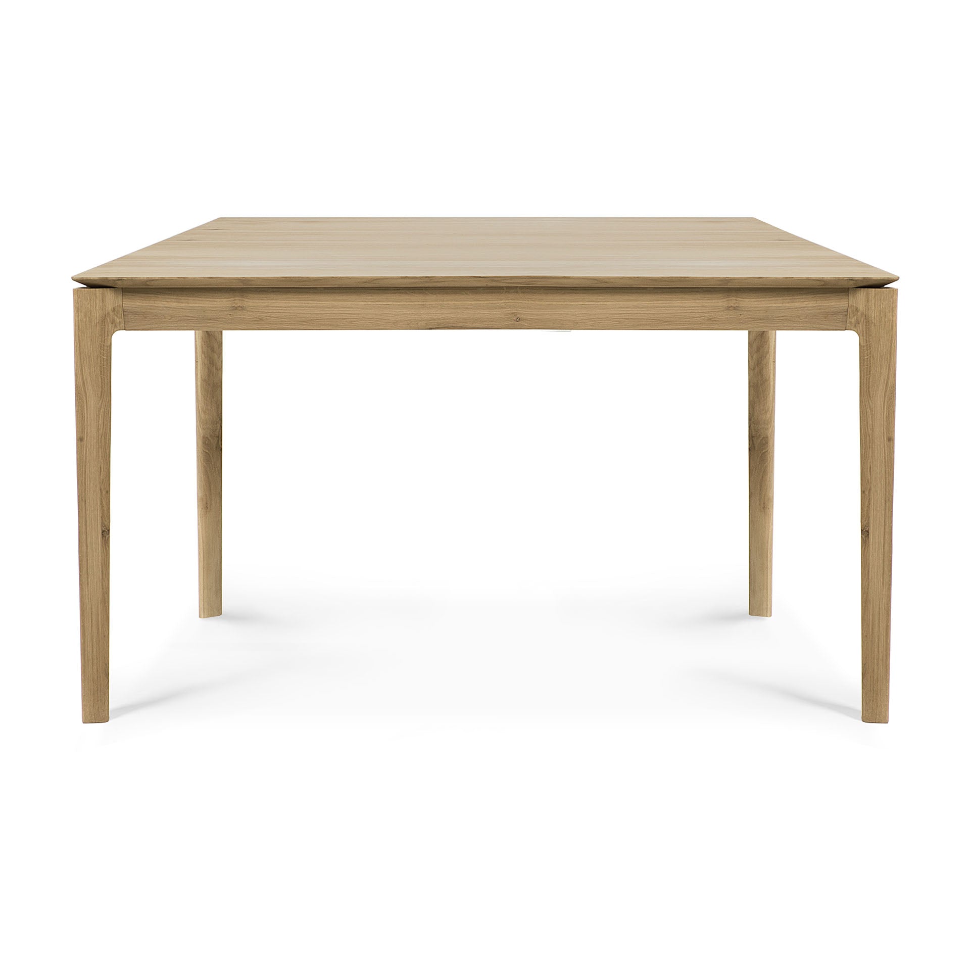 The Bok Dining Table - Varnished Oak by Ethnicraft is a rectangular solid oak table with four straight legs, shown from the short end against a white background. Its design is simple, modern, and features a natural varnished wood finish.