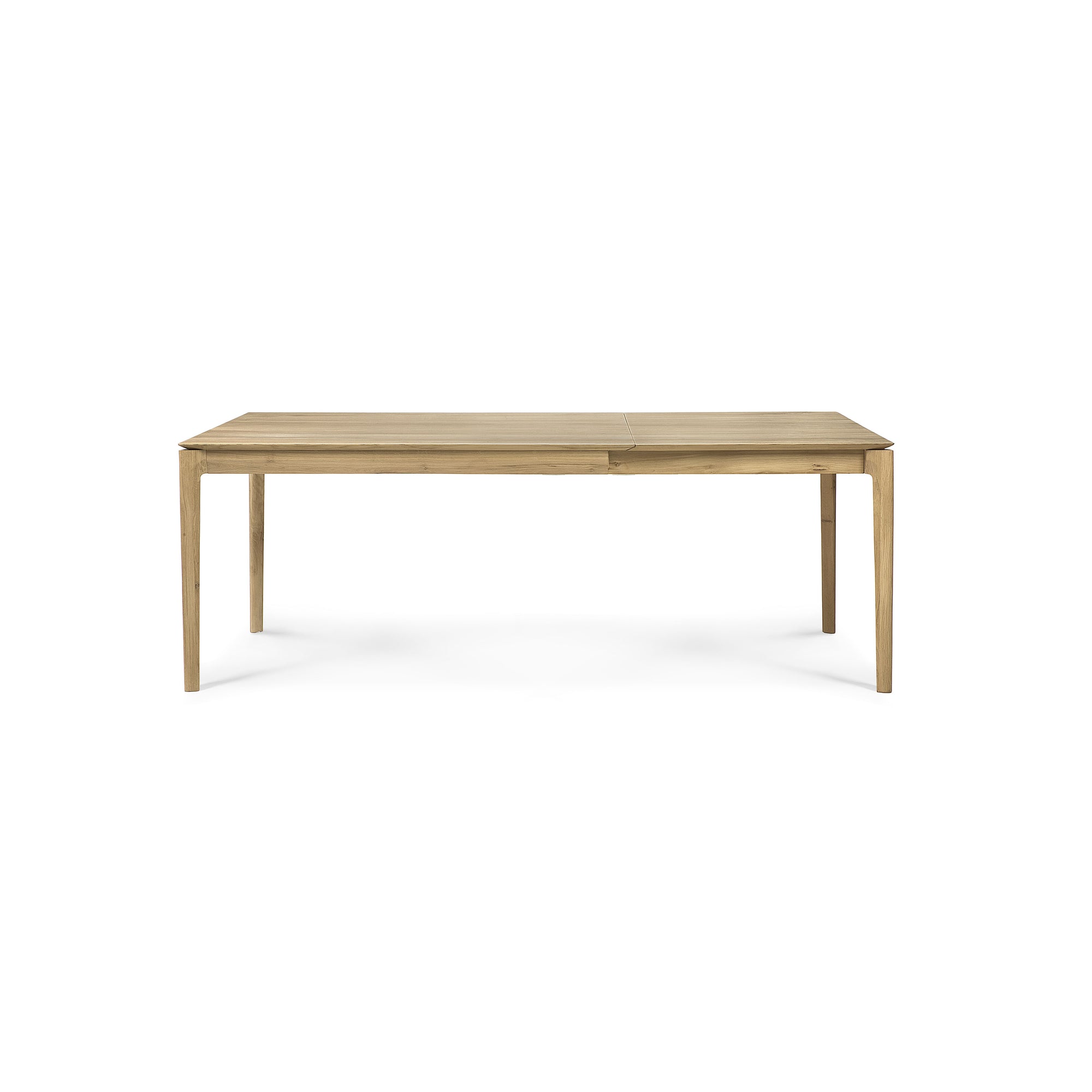 The Ethnicraft Bok Extendable Dining Table in varnished oak features a minimalist rectangular design with four straight legs, shown against a plain white background.