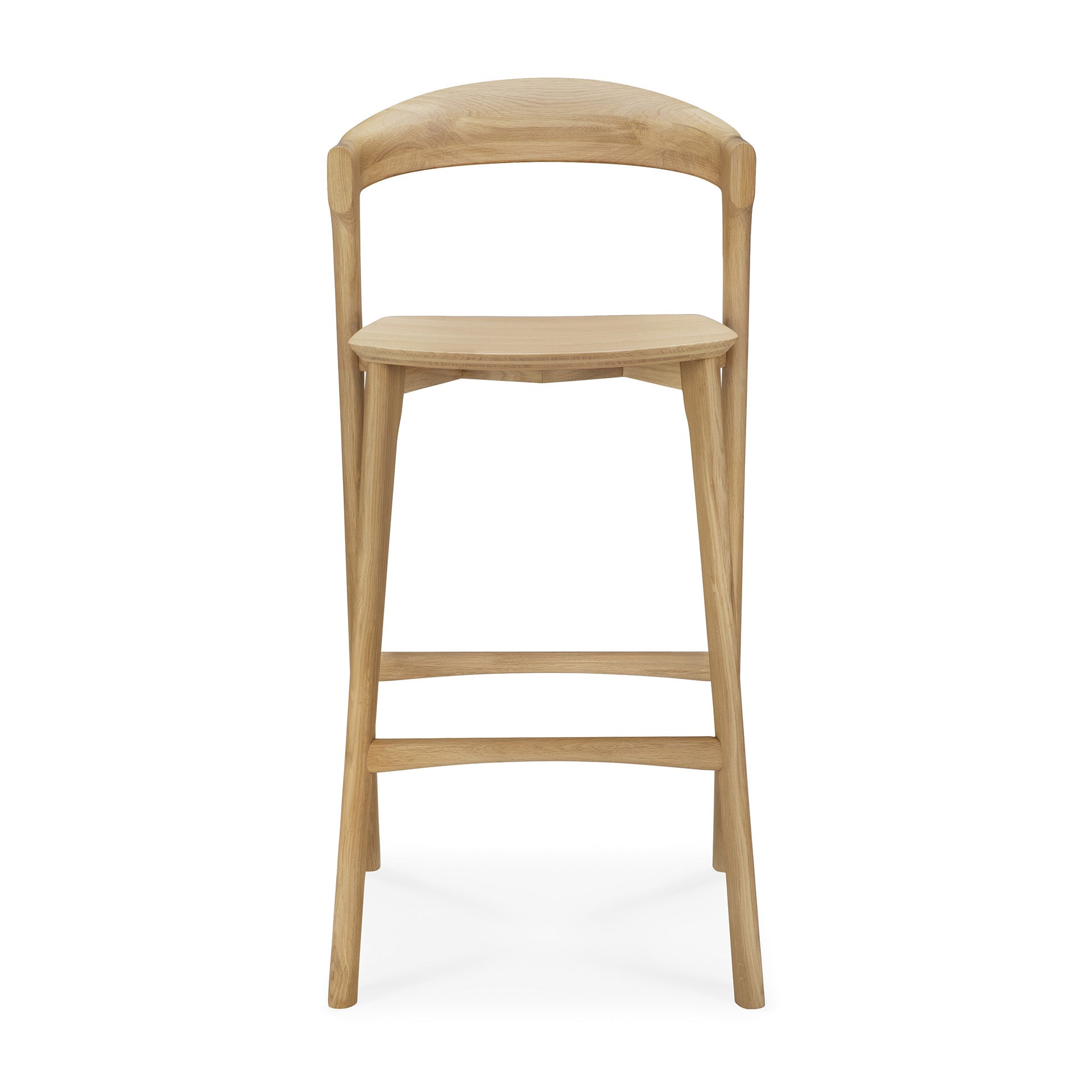 The Ethnicraft Bok bar stool - Oak features a curved backrest and seat, four legs, and two footrests. Its solid oak finish highlights a simple, modern design.