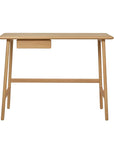 The Wooden Stories Author Desk | Light Oak features a minimalist Danish design with a rectangular top, one small left drawer, and four angled legs joined by a support bar—perfect for any modern workspace.
