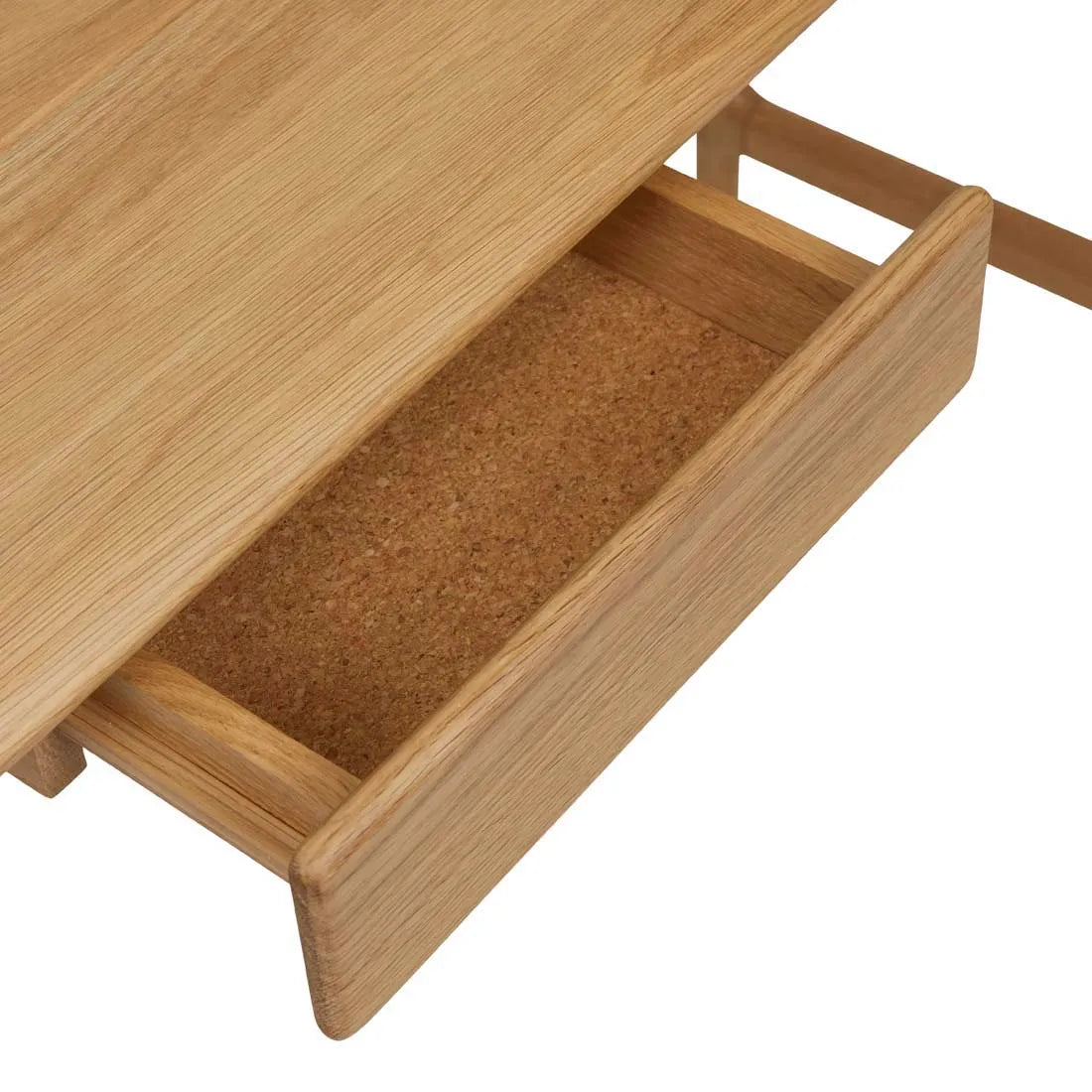 A close-up of the Author Desk | Light Oak by Wooden Stories shows an open drawer with an empty, brown textured interior.