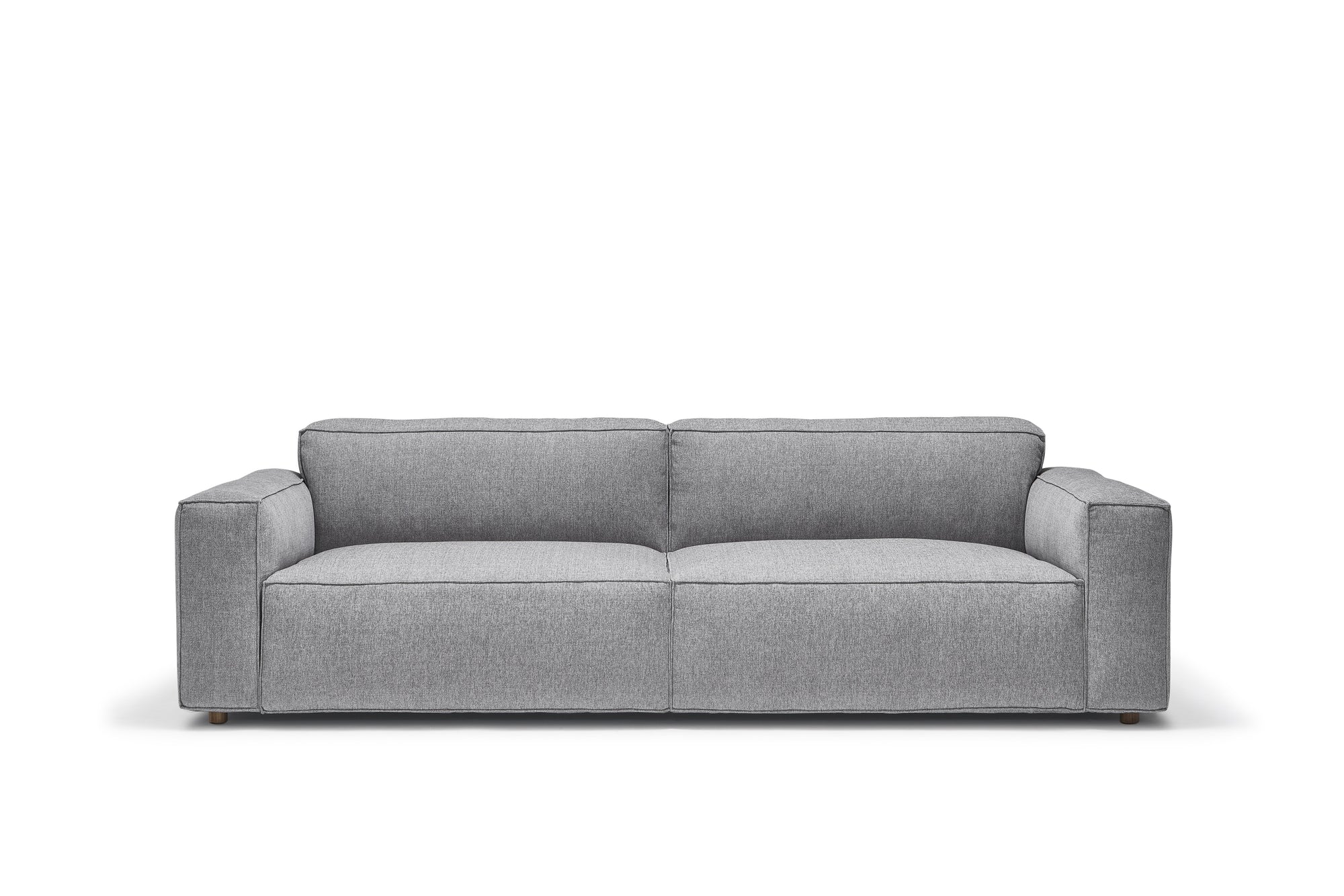The Baker Sofa | Fabric by Wooden Stories is a modern, light gray sofa with wide armrests and two seat cushions, displayed against a plain white background.