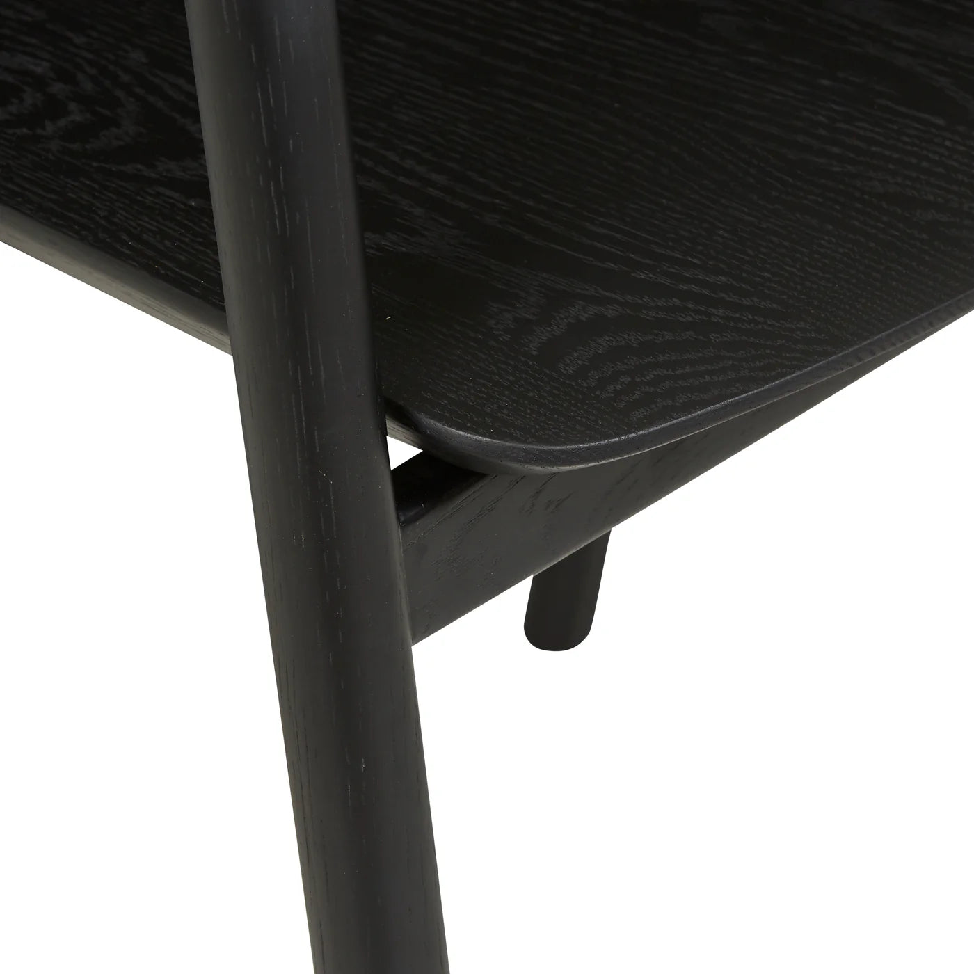 Close-up of the Wooden Stories Inlay Dining Chair | Black Oak, showcasing its Danish-inspired lines, detailed wood grain texture, and smooth, rounded edges on the seat, leg, and frame.