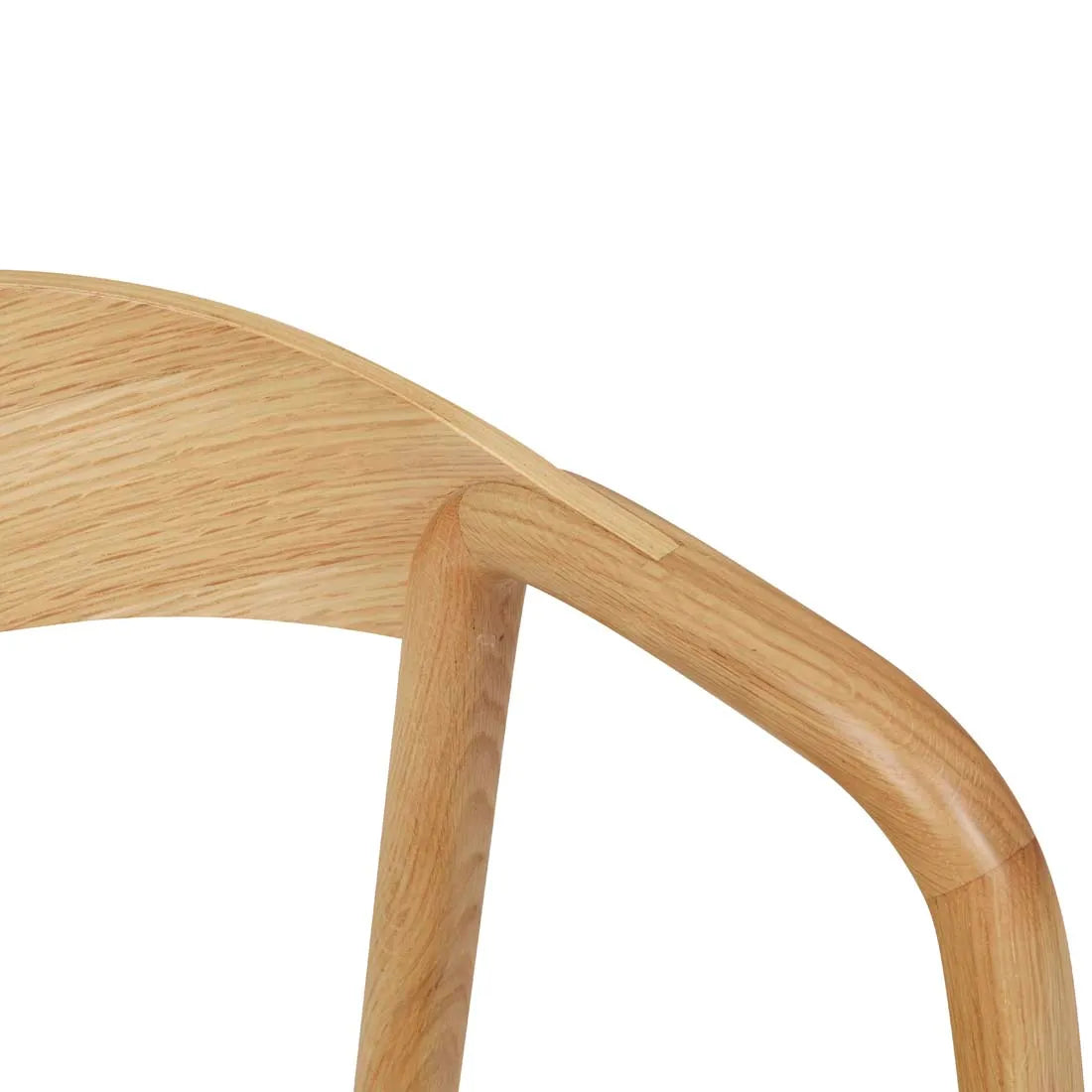 Close-up of Wooden Stories Inlay Dining Chair | Light Oak, capturing the curved backrest and armrest details, and showcasing the natural wood grain and smooth finish.