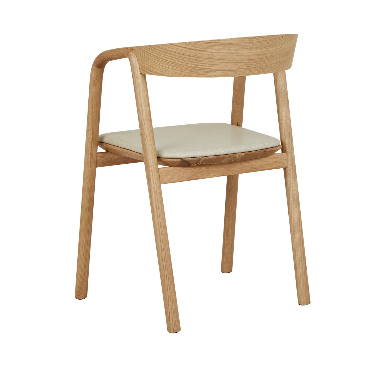 The Wooden Stories Inlay Dining Chair in Light Oak and Leather features a curved plywood backrest, light beige leather seat, and minimalist design with clean lines, shown here from an angled rear view.