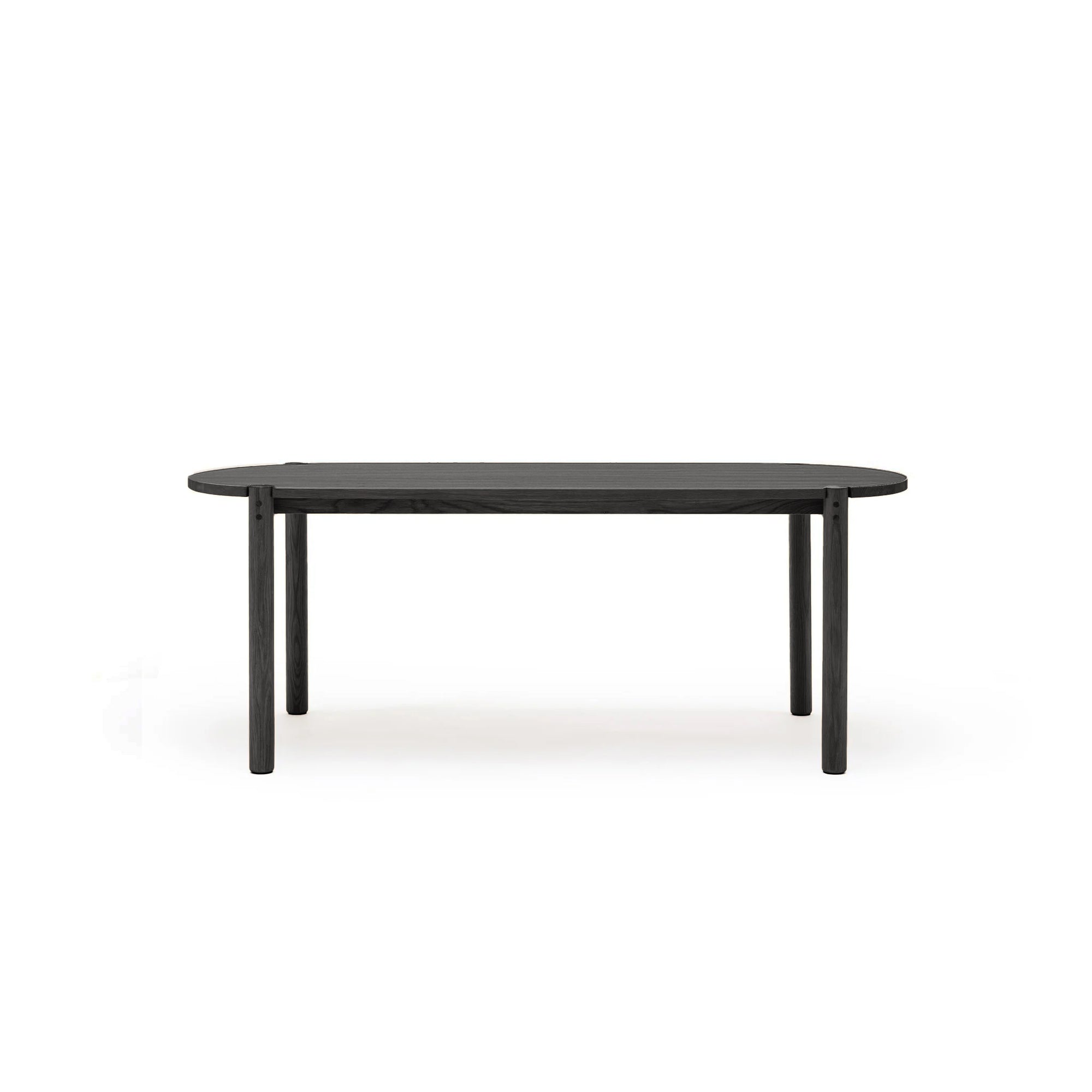 The Cove Dining Table | Black Oak by Wooden Stories is a contract-grade dining table made from solid American oak, featuring a rectangular top with rounded edges and four straight legs, shown against a plain white background.