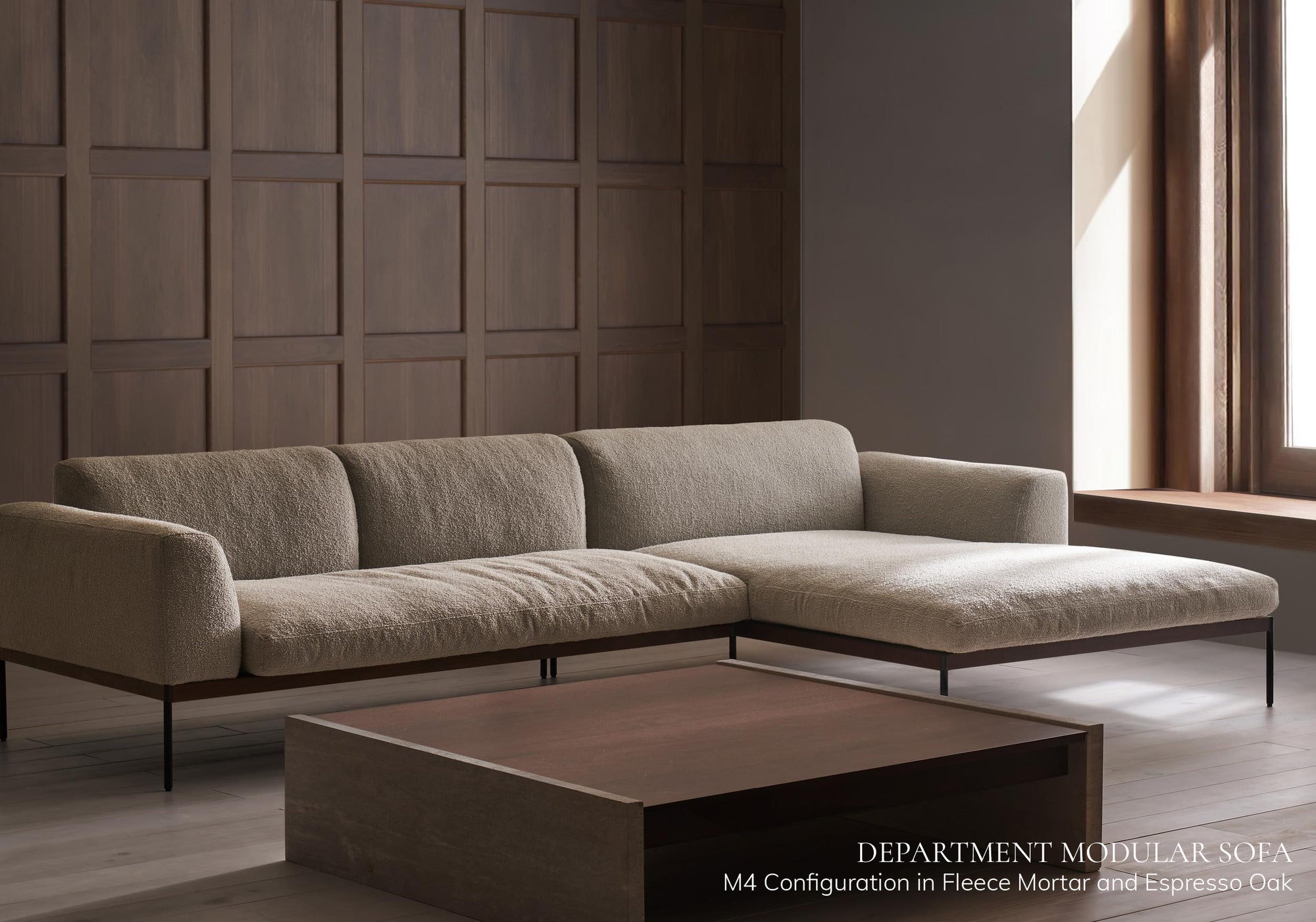 A modern living room features the Wooden Stories Department Modular Sofa | Fabric • M5 Right with a solid wood base and a low square wooden coffee table, set against dark brown wood paneling. Text highlights sofa configurations and finishes.