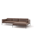 The Department Modular Sofa | Leather • M4 by Wooden Stories is a modern sectional with brown leather, slim black metal legs, and a right-side chaise lounge, inspired by Danish design and shown on a white background.