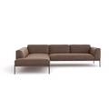 The Wooden Stories Department Modular Sofa | Leather • M6 features an L-shaped brown design with low backrests, wide cushions, slim black metal legs, and an FSC-certified oak solid wood base inspired by Danish collections.