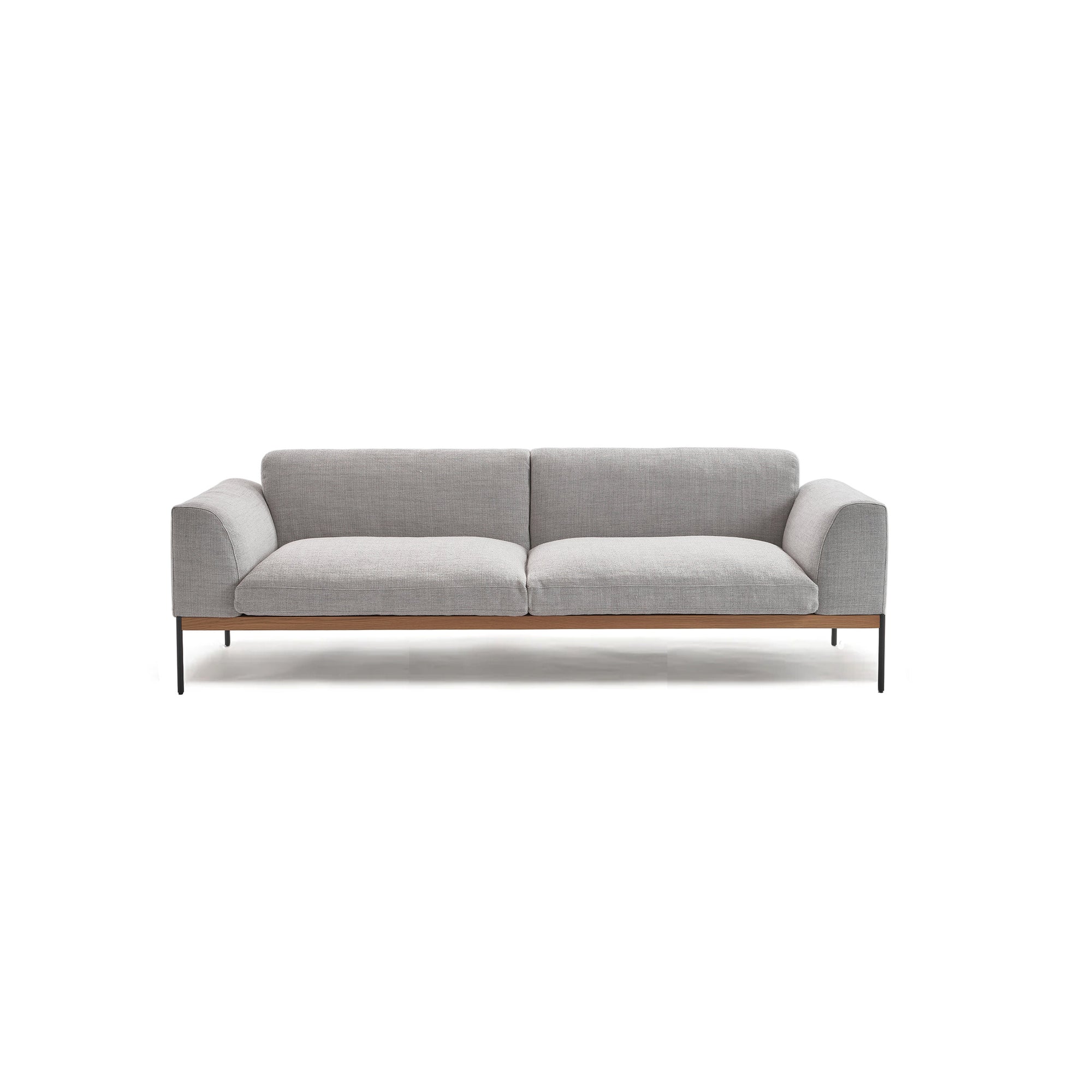 The Wooden Stories Department Sofa | Fabric features a modern Scandinavian design in light gray fabric with wide armrests, a low back, and slim black metal legs, shown against a plain white background.