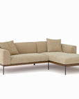 The Wooden Stories Department Modular Sofa | Fabric • M1 Right is a modern beige sectional with two seat and back cushions, a right chaise, upholstered platform, and slim black metal legs, shown on a plain white background.