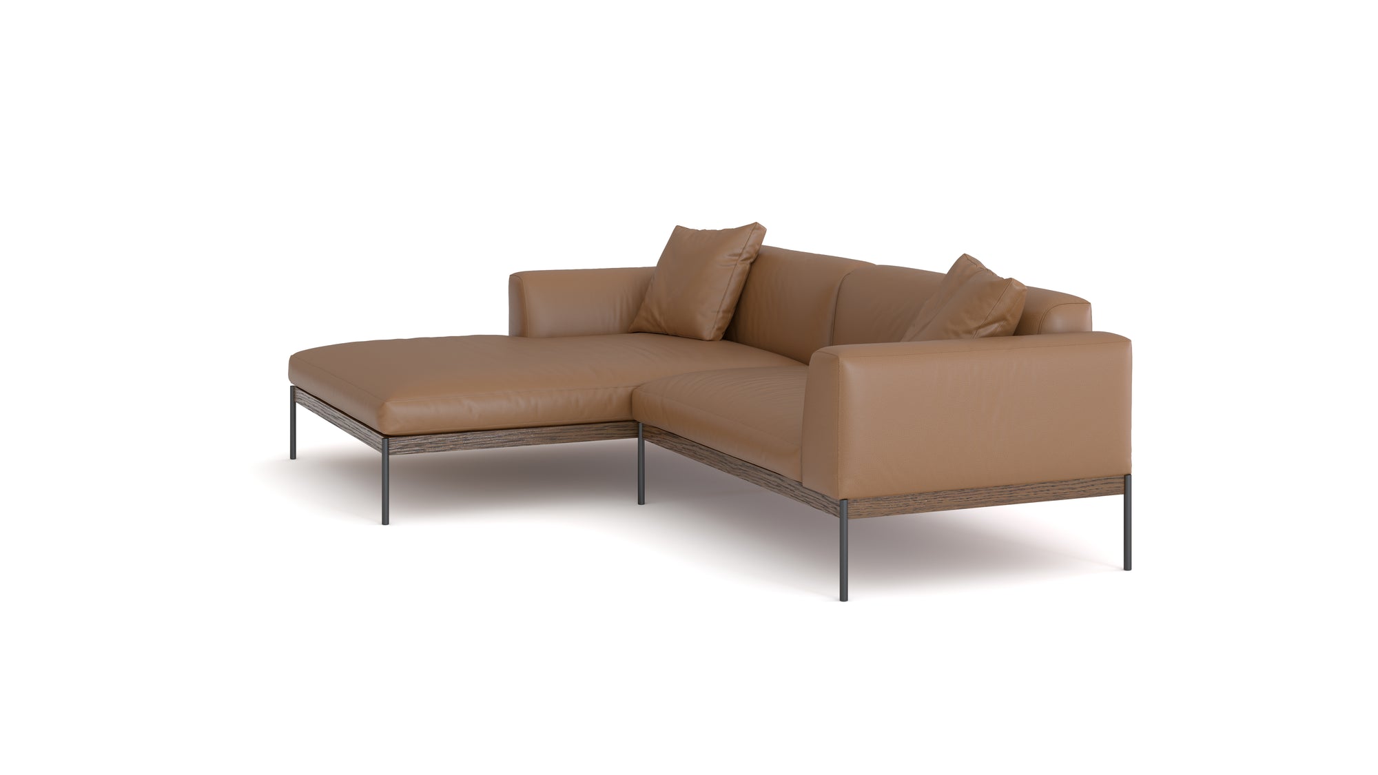 The Department Modular Sofa | Leather • M3 Left by Wooden Stories features modern brown leather, metal legs, a left-side extended chaise, and two matching cushions, inspired by Danish design and shown against a plain white background.
