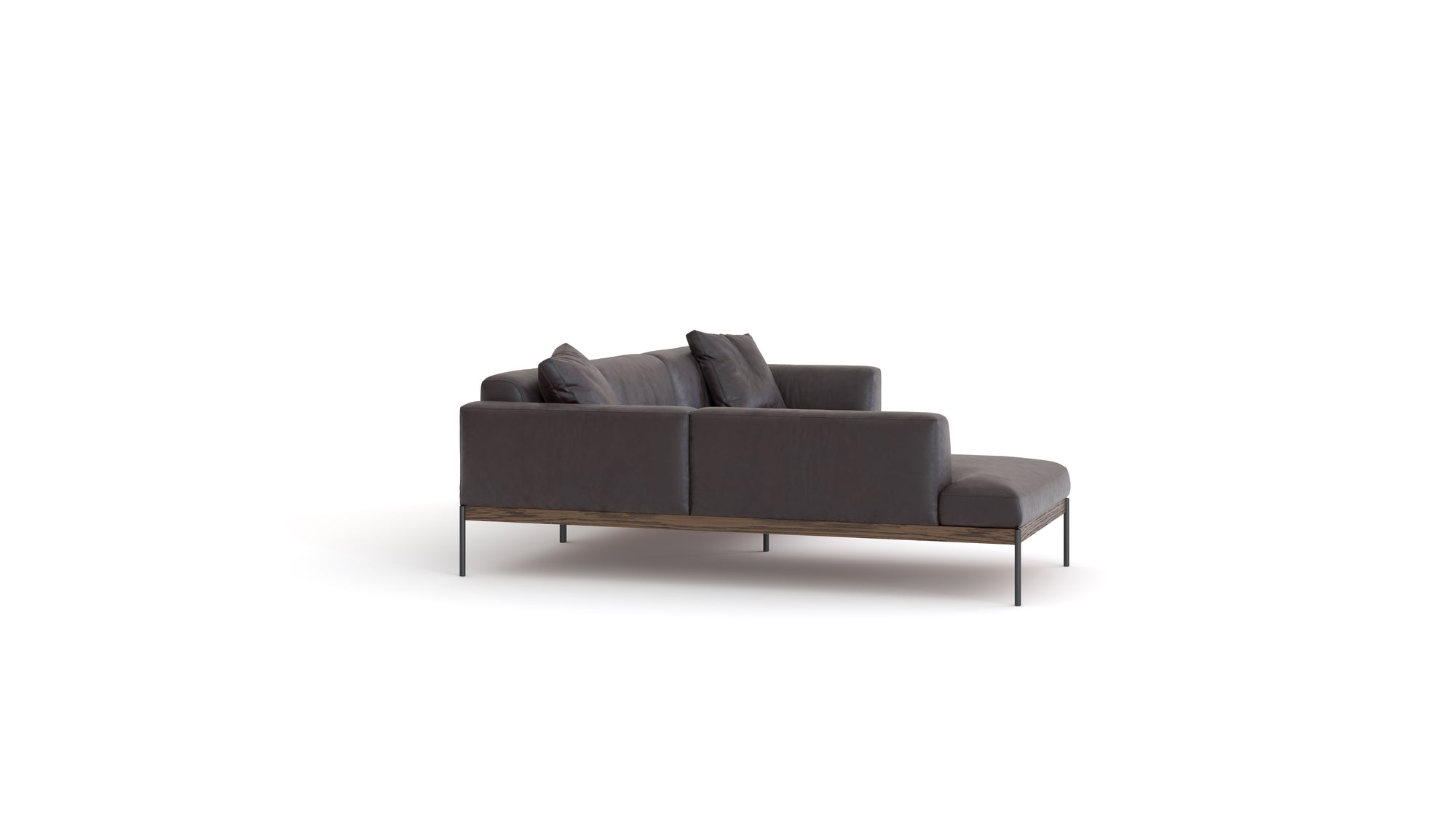 The Department Modular Sofa | Leather • M4 Left by Wooden Stories features a modern design, dark gray leather, slim metal legs, multiple matching cushions, and a solid wood base inspired by Danish collections, shown on a white background.