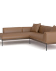 The Wooden Stories Department Modular Sofa | Leather • M5 Left features brown leather upholstery, metal legs, a solid wood base, and two matching cushions, showcased against a plain white background.