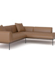 The Department Modular Sofa | Leather • M5 Right by Wooden Stories is a modern L-shaped sectional in tan leather, featuring thin metal legs, a solid wood base, and two matching cushions, inspired by Danish collections on a white background.
