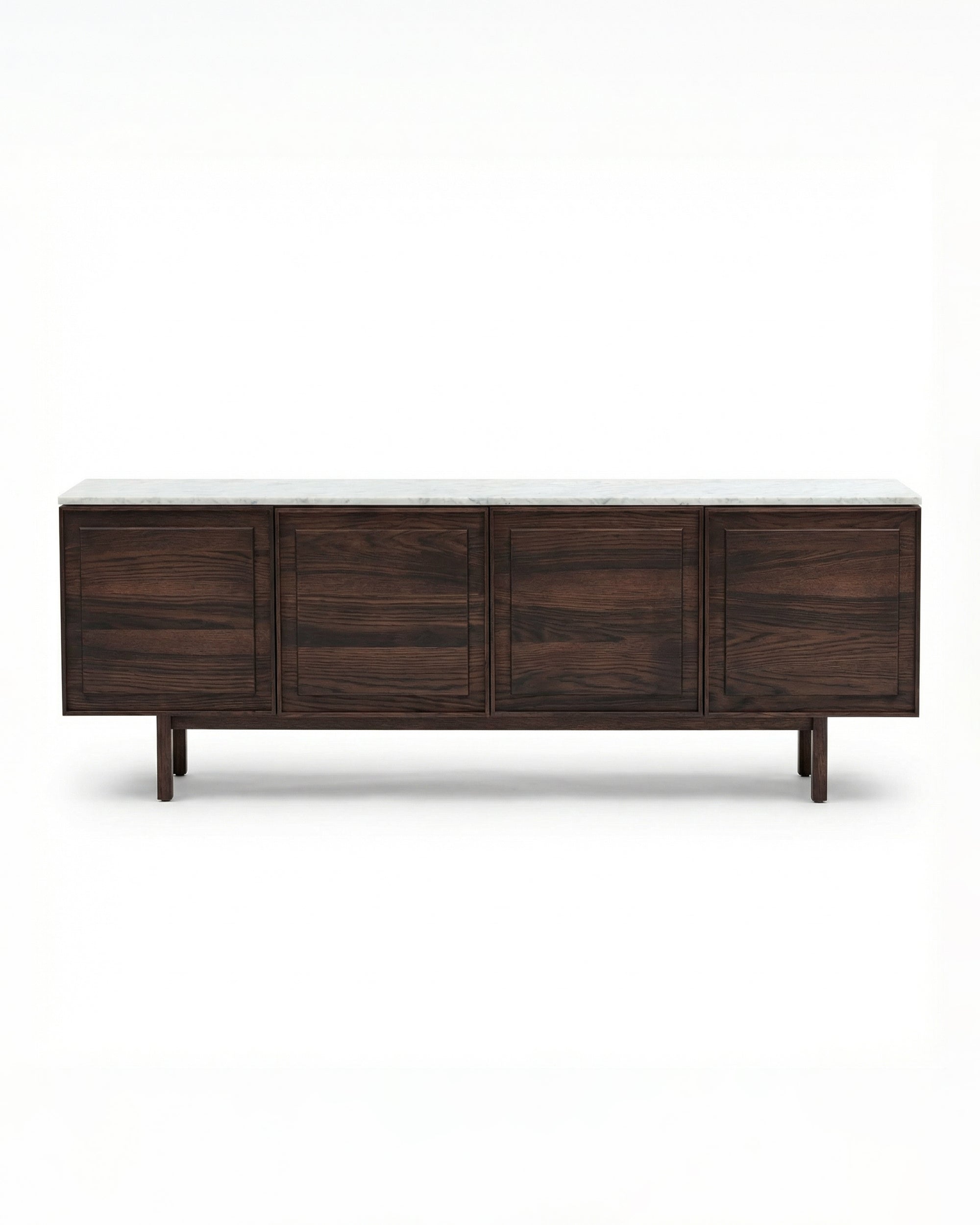 The Wooden Stories Yorke Sideboard with Stone Top features Danish-inspired lines, four paneled cabinet doors, dark wood finish, a white stone top, and short legs, shown against a plain white background.