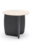 The Eden Side Table | Stone Top by Wooden Stories features a round, light-colored stone top and an intersecting solid wood base. Shown against a white background, its contract grade construction offers lasting durability.