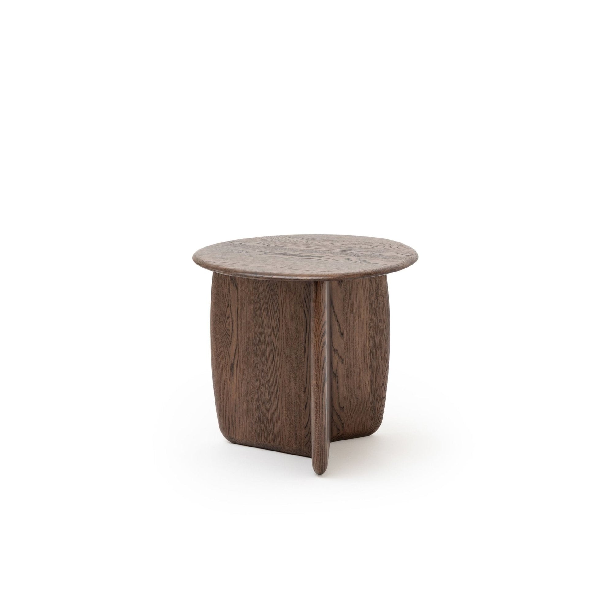 The Eden Side Table by Wooden Stories is a small, round, dark solid wood table with a smooth top and intersecting base, inspired by Scandinavian design and photographed on a plain white background.