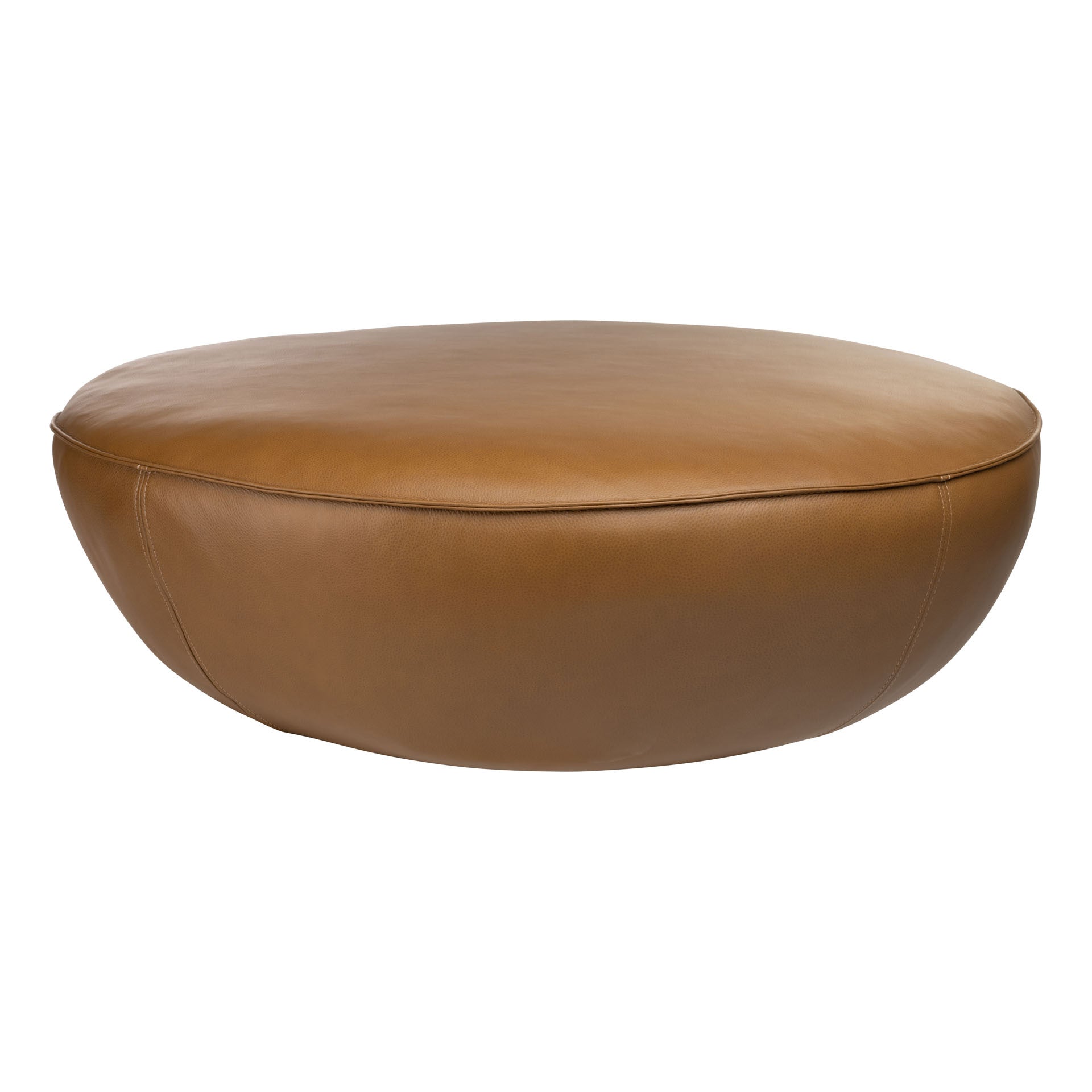 The Fable Ottoman | Leather by Wooden Stories is a round, low-profile ottoman in smooth tan leather, featuring minimal stitching and a modern, Danish-inspired design.