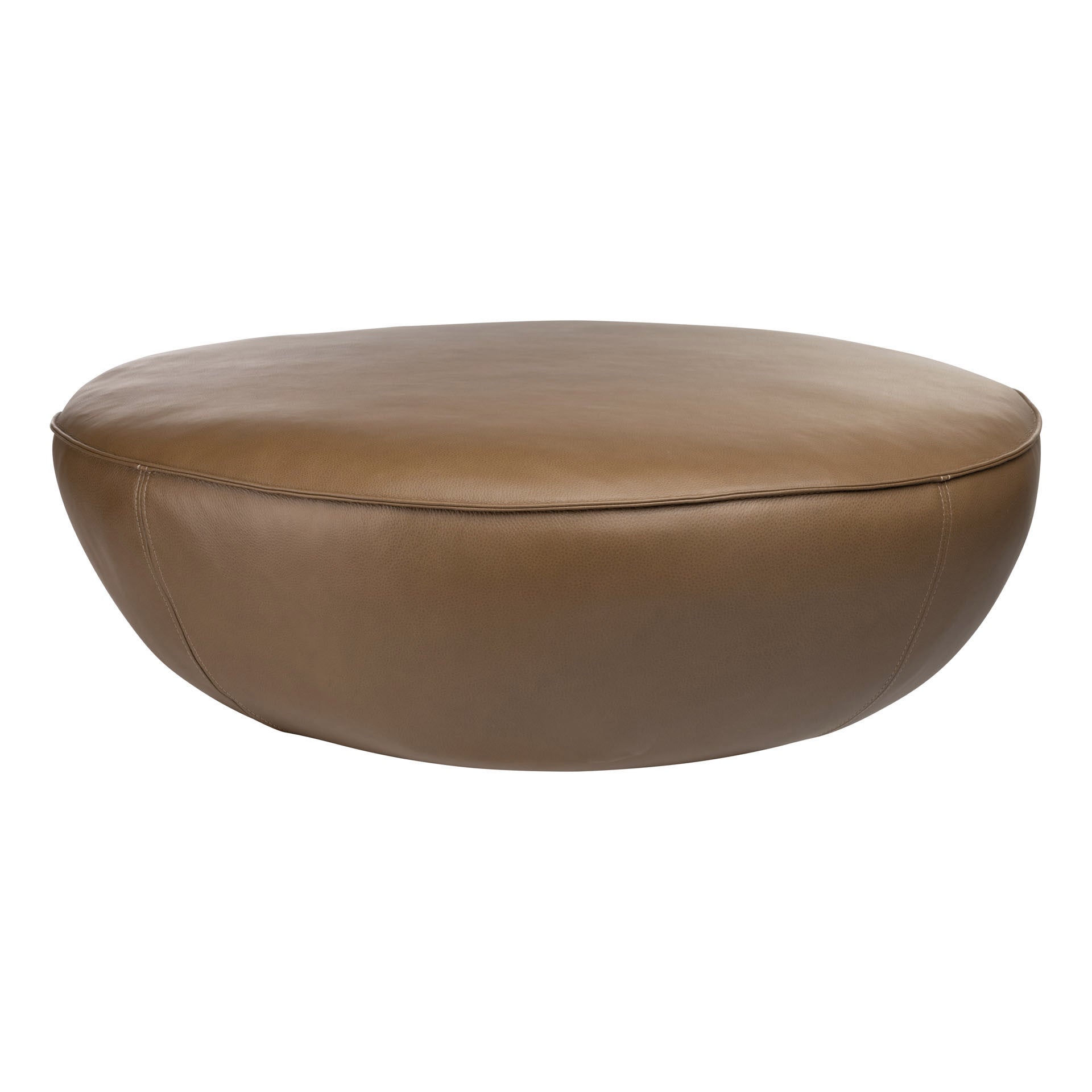 The Fable Ottoman | Leather by Wooden Stories is a large, round ottoman with smooth leather upholstery and minimal stitching, resting directly on the floor for a touch of Danish elegance in any room.