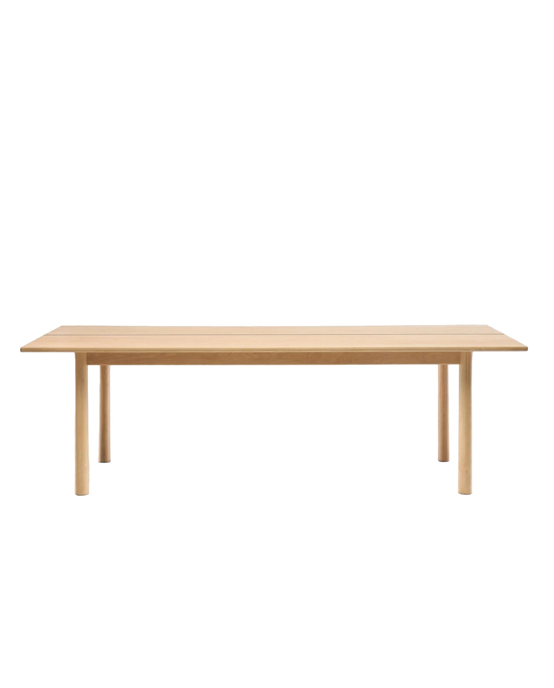The Itamae Dining Table by Wooden Stories is a rectangular solid light oak table with a smooth surface and four round legs in classic Scandinavian design, shown against a plain white background.