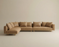 The Islet Modular Sofa | Leather • M2 by Wooden Stories is a large, modern L-shaped tan leather sectional with seven matching back cushions, clean lines, and low wooden legs, set against a plain beige background.
