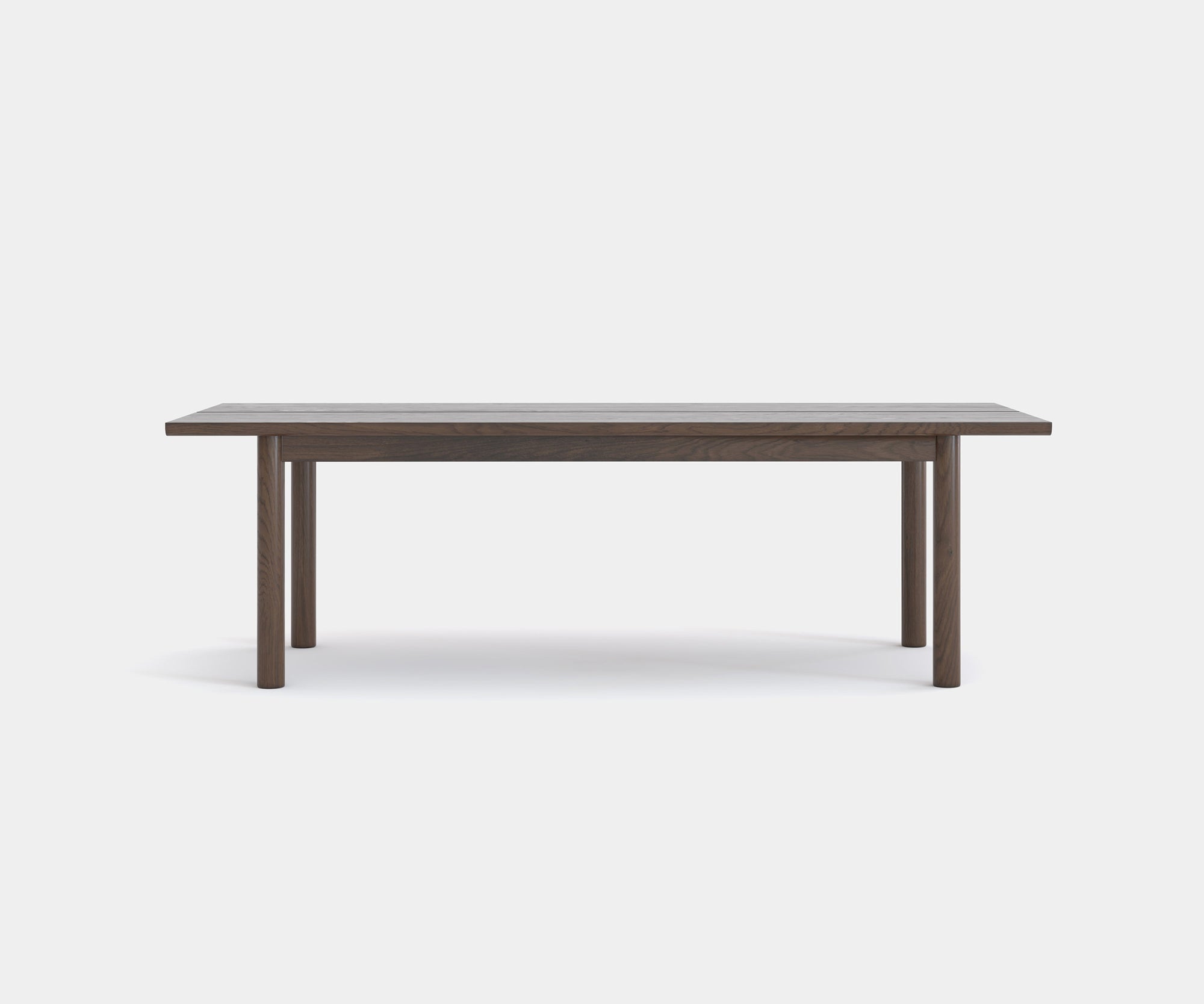 The Itamae Dining Table by Wooden Stories features a simple rectangular design in solid espresso oak with four straight legs, shown against a plain white background.