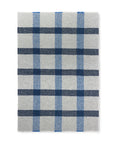 The Lava Throw - Cobalt Blue by Elvang Denmark features a gray base with intersecting blue plaid lines in varying shades, inspired by Scandinavian design.