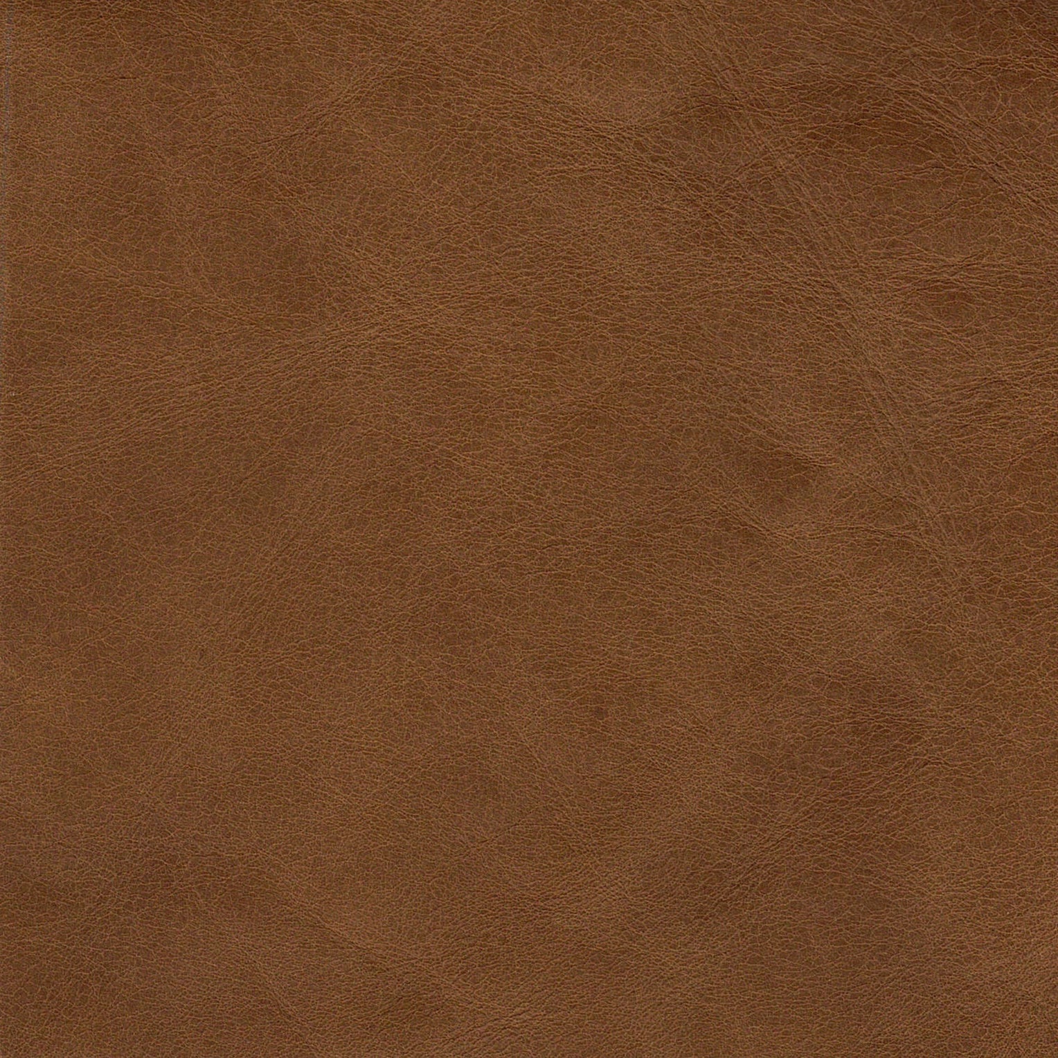 Old Saddle brown leather on the N701 Modular Sofa by Ethnicraft features a subtle natural grain and gentle wrinkles, offering a soft, organic look. The smooth and even surface makes it an excellent choice for European design upholstery, modular sofas, or chic fashion accessories.