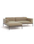 The Department Modular Sofa | Fabric • M1 by Wooden Stories is a modern beige sectional with upholstered sections, left-side chaise lounge, slim black metal legs, and a low solid wood base, shown on a white background.