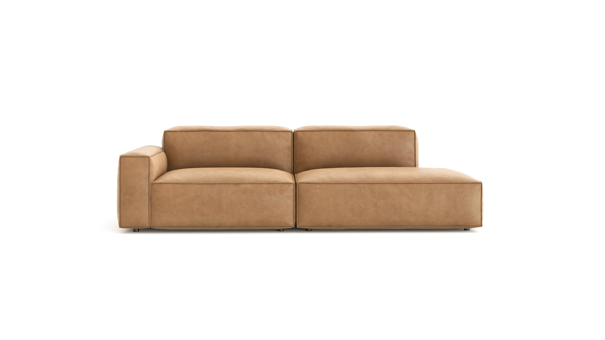 The Baker Modular Sofa | Leather • M1 by Wooden Stories features tan leather, a left armrest, wide cushioned seats, and a low profile—an ideal contemporary sofa for modern spaces, shown against a plain white background.