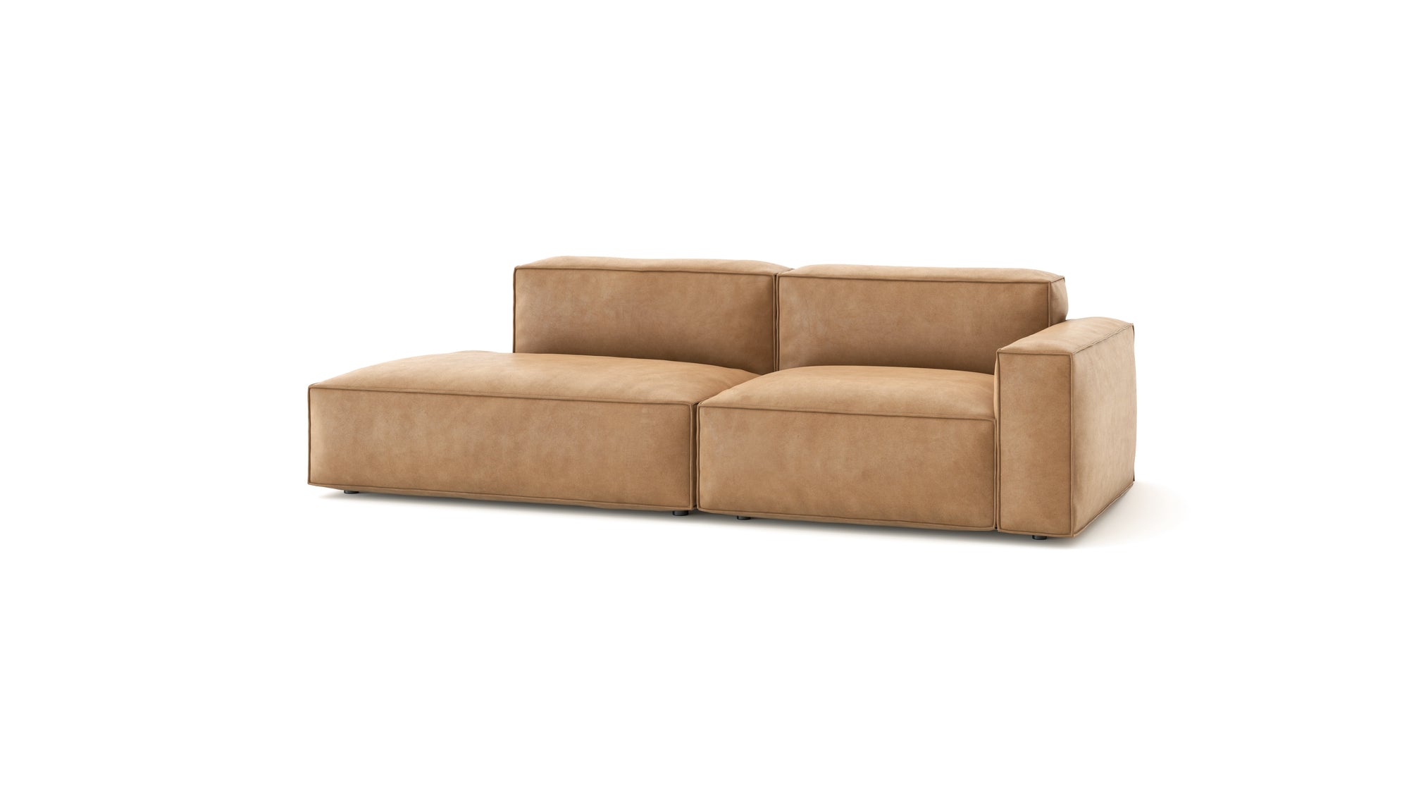 The Wooden Stories Baker Modular Sofa | Leather • M1 is a modern, light brown modular sofa with wide seats, low backs, a left chaise lounge, and right armrest, shown against a plain white background.