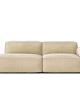 The Baker Modular Sofa | Fabric • M1 by Wooden Stories is a modern beige sofa with a low profile, wide cushions, right-side armrest, and minimalist design, displayed against a plain white background.