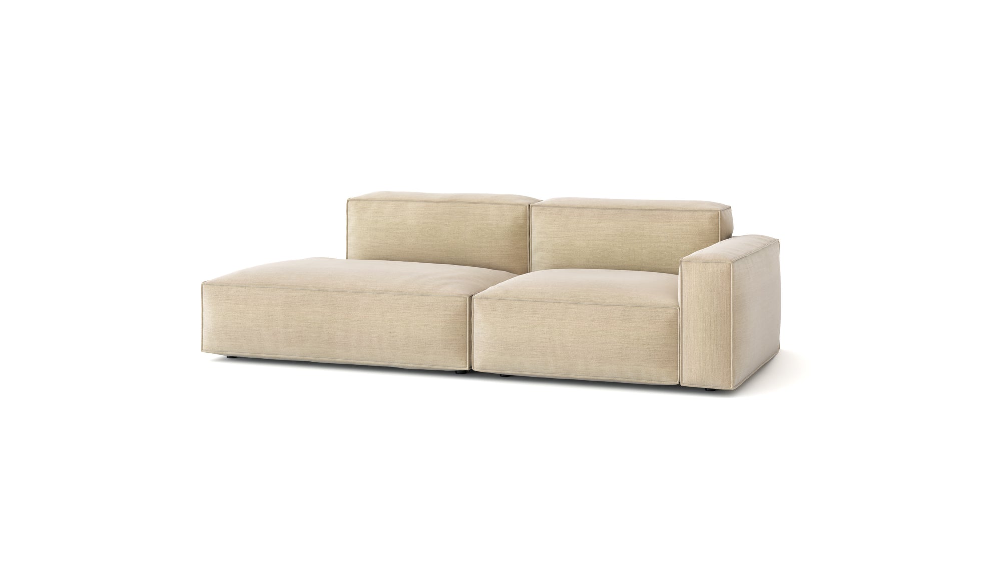 The Baker Modular Sofa | Fabric • M1 by Wooden Stories is a contemporary beige modular piece with wide seats, two backrests, and a right armrest, displayed against a plain white background.