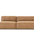 The Baker Modular Sofa | Leather • M2 by Wooden Stories features tan leather upholstery, a low back, wide seats, and a right-side armrest, all set against a plain white background for a modern look.