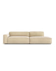 The Baker Modular Sofa | Fabric • M2 by Wooden Stories is a modern light beige sofa with clean lines, one left armrest, and a right-side chaise lounge, shown against a white background.