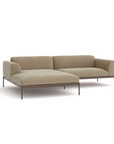 The Department Modular Sofa | Fabric • M3 by Wooden Stories is a modern beige sectional with a left chaise, sleek metal legs, and a solid wood base inspired by Danish design, displayed against a white background.
