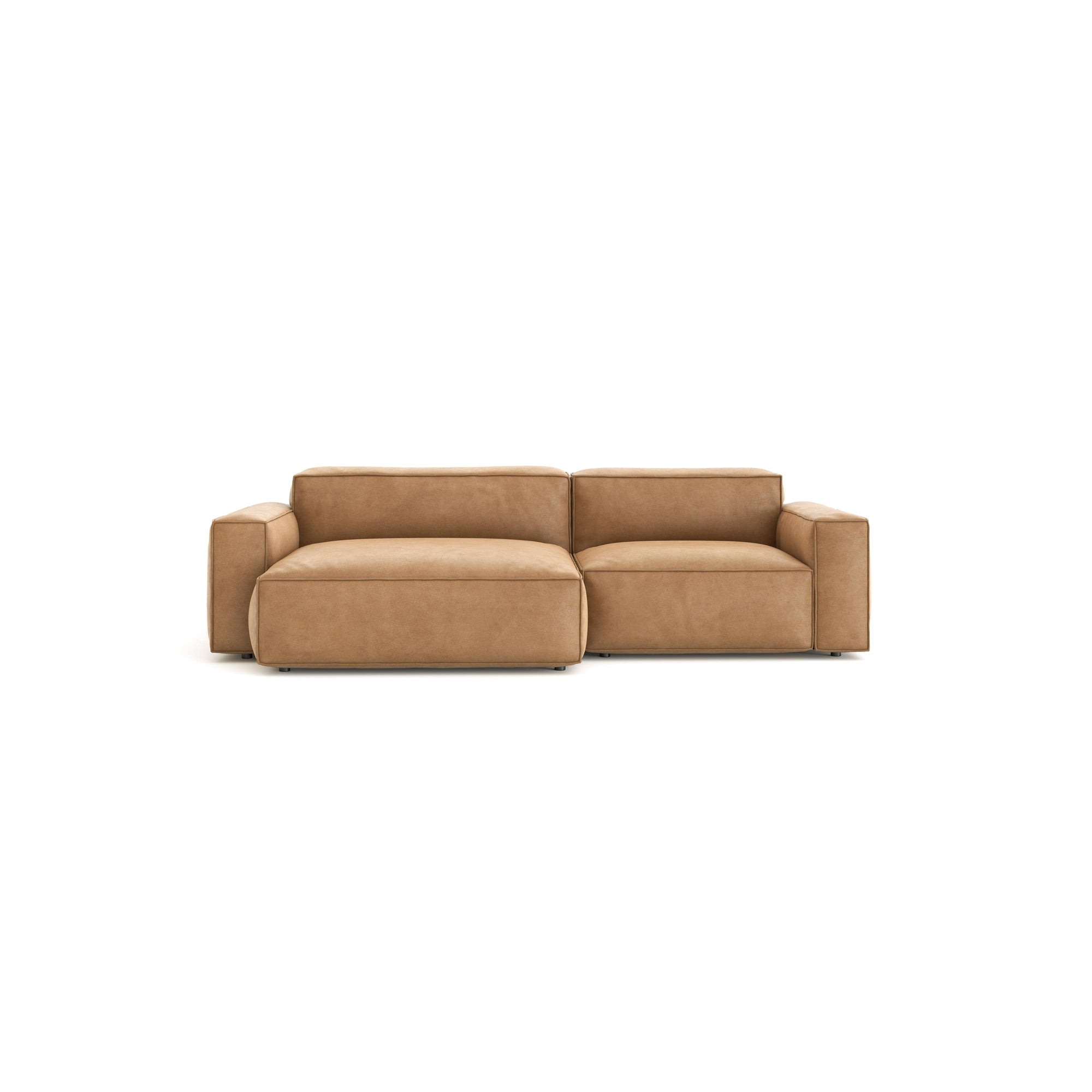 The Baker Modular Sofa | Leather • M3 by Wooden Stories features tan leather, wide armrests, and a chaise lounge—ideal for those seeking a stylish, contemporary modular sofa.