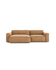 The Baker Modular Sofa | Leather • M3 by Wooden Stories features tan leather, wide armrests, and a chaise lounge—ideal for those seeking a stylish, contemporary modular sofa.